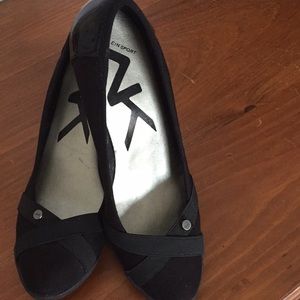 Anne Klein sports woman’s fabric wedge pump